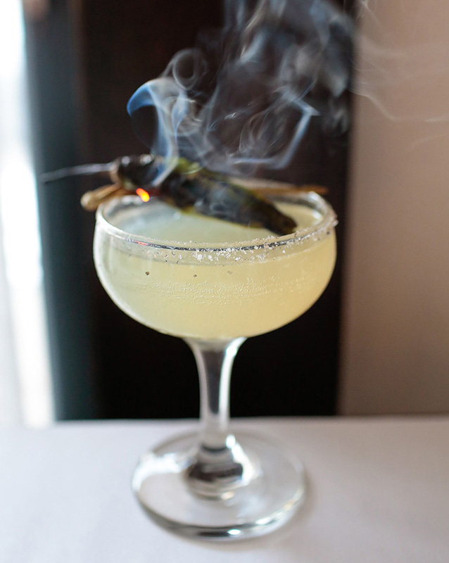 Smoke and fire specialty cocktail
